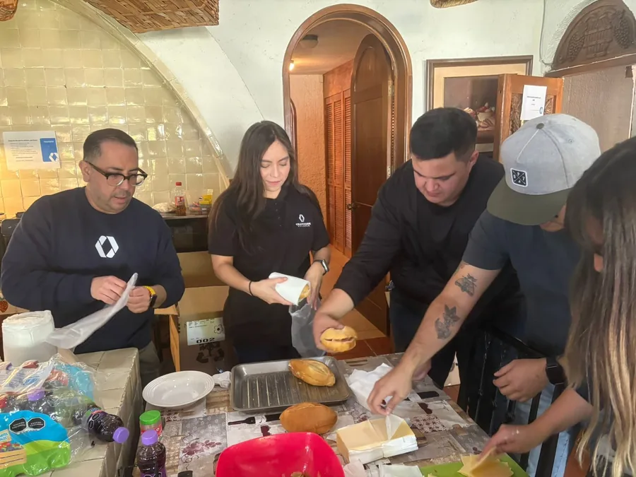 The Mexico team preparing meals in Queretaro