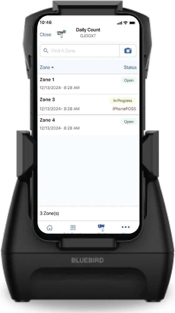 A Bluebird RFID sled reader with an iPhone running the Teamwork Commerce daily count screen